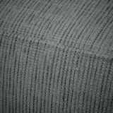 Nahaufnahme einer grauen, strukturierten Stoffoberfläche einer Recamiere, die die Textur und das Material des Möbelstücks zeigt.