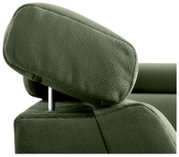 Grüne Kopfstütze eines Sofas aus der Seitenperspektive