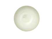 Ansicht von oben auf einen cremefarbenen Teller mit leicht gesprenkeltem Design.