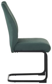 Seitenansicht eines grünen Schwingstuhls mit schwarzem Metallgestell