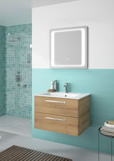 Moderner Badblock mit Holzoptik und zwei Schubladen, darunter ein beleuchteter Spiegel. Perspektive: Frontalansicht.