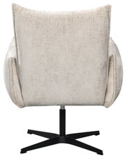 Achterkant van een beige relaxfauteuil met een zwart draaipoot.