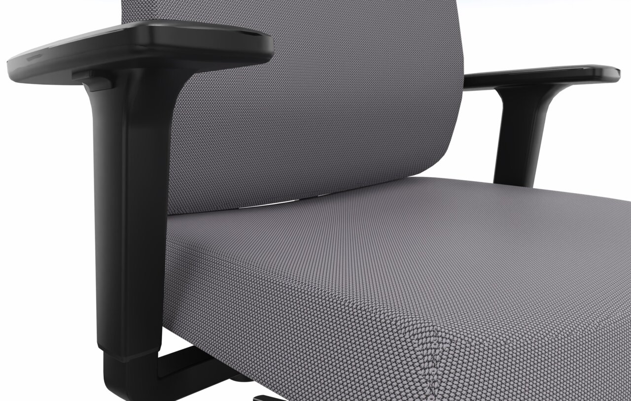 Dauphin Drehstuhl INDEED Nahaufnahme eines grauen Drehstuhls mit schwarzen Armlehnen, seitliche Perspektive