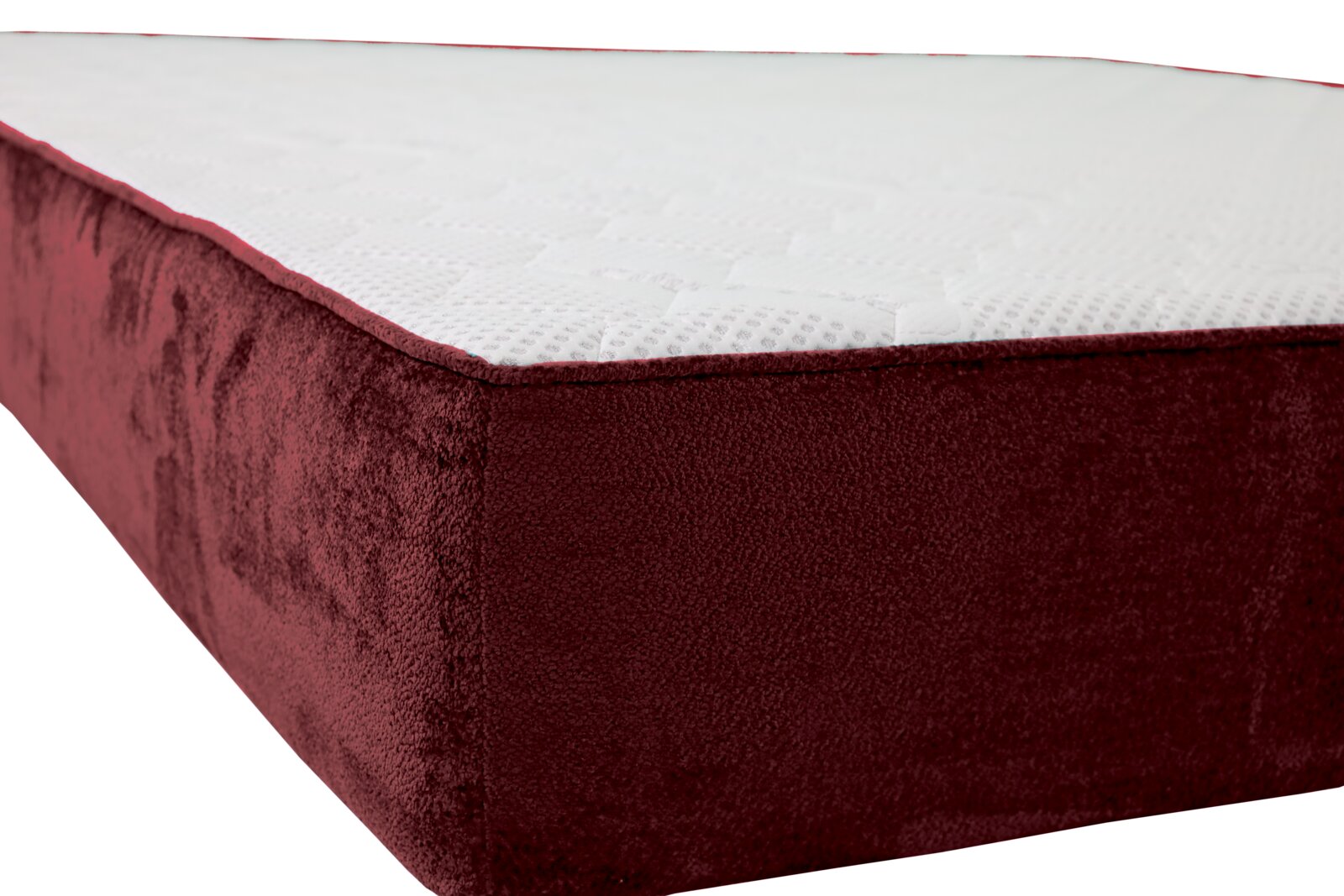 Close-up van een gestoffeerd bed met donkerrode bekleding, zijaanzicht