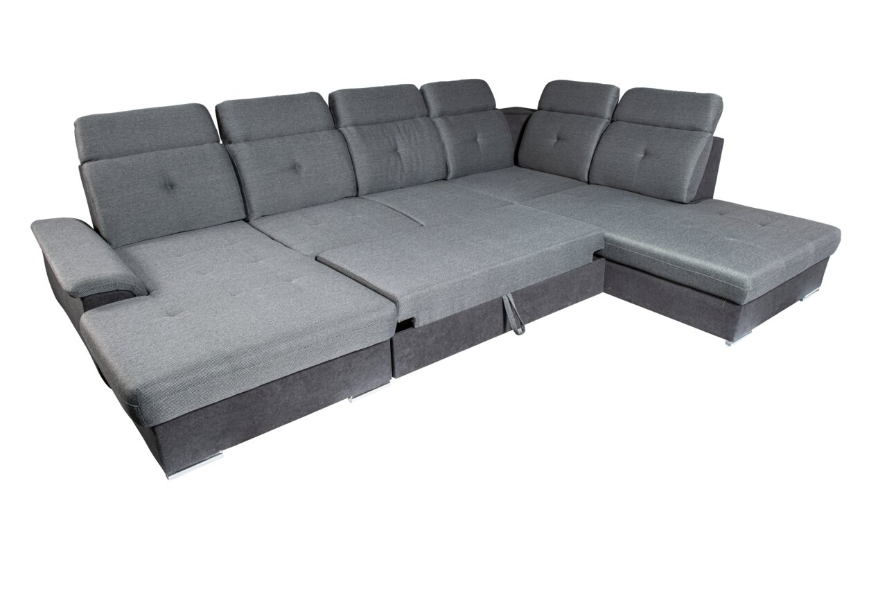 Graues Ecksofa in U-Form mit verstellbaren Rückenlehnen, aus der Vogelperspektive fotografiert.