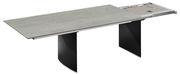 Moderner Esstisch mit ausziehbarer Tischplatte in Betonoptik, seitliche Perspektive.
