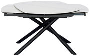 Moderne eettafel met uitschuifbaar wit tafelblad en zwarte, gekruiste poten, gezien vanaf de zijkant.