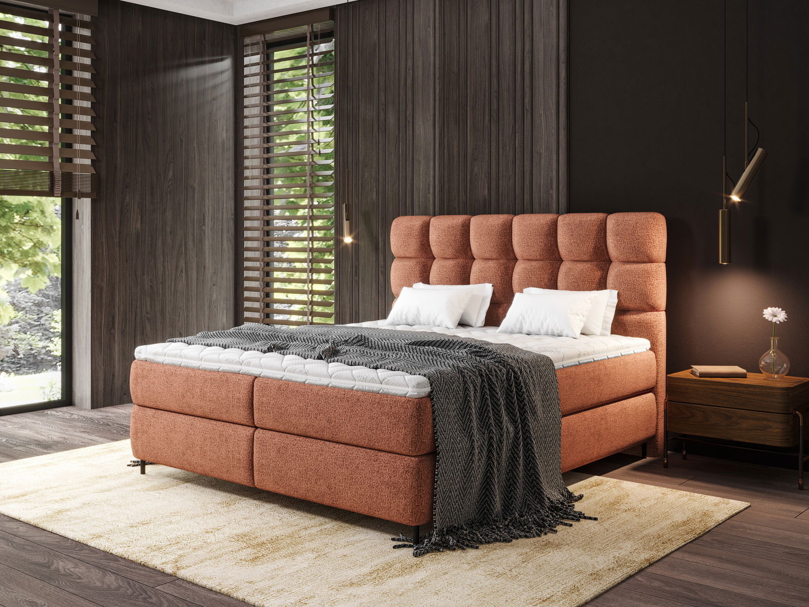 Boxspringbett in einem modernen Schlafzimmer, seitliche Perspektive, mit gepolstertem Kopfteil und dekorativen Kissen.