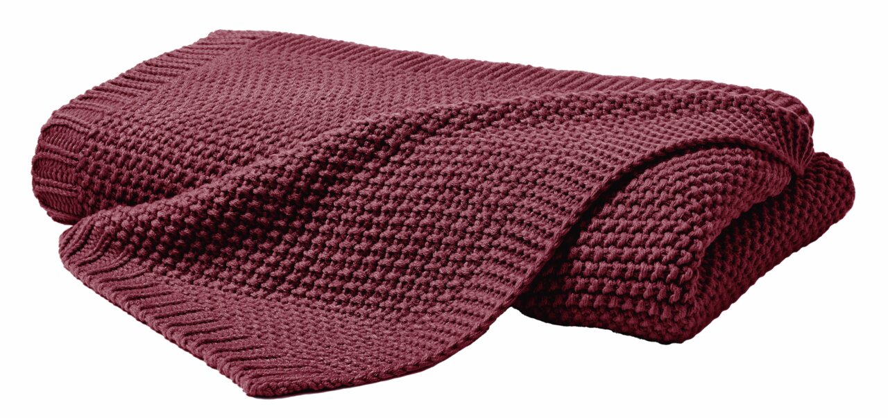 Rote Strickdecke 130x170 cm, gefaltet, aus seitlicher Perspektive