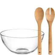 Glazen schaal met houten saladebestek, zijaanzicht