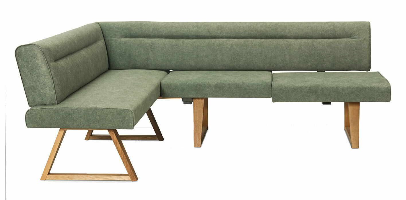 Grüne Eckbank mit Holzbeinen, seitliche Perspektive