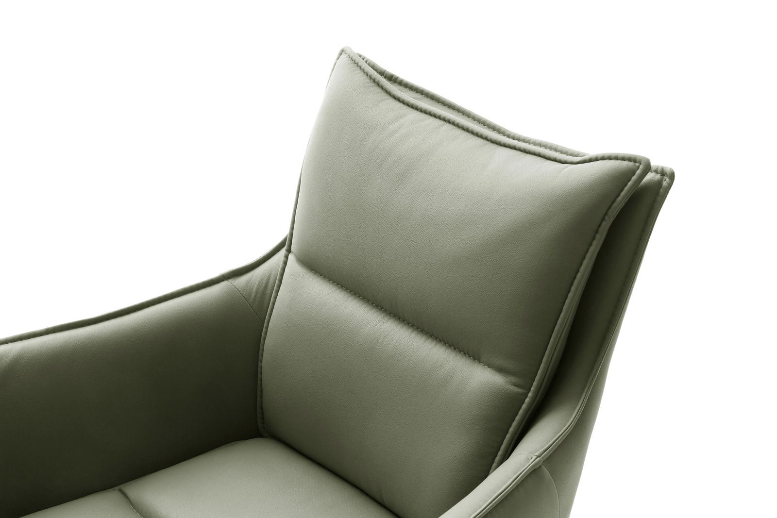 Nahaufnahme eines grünen Sessels aus Leder, Ansicht von schräg oben.