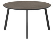 Runder Gartentisch mit dunkler Tischplatte und schwarzen Beinen, frontal betrachtet.