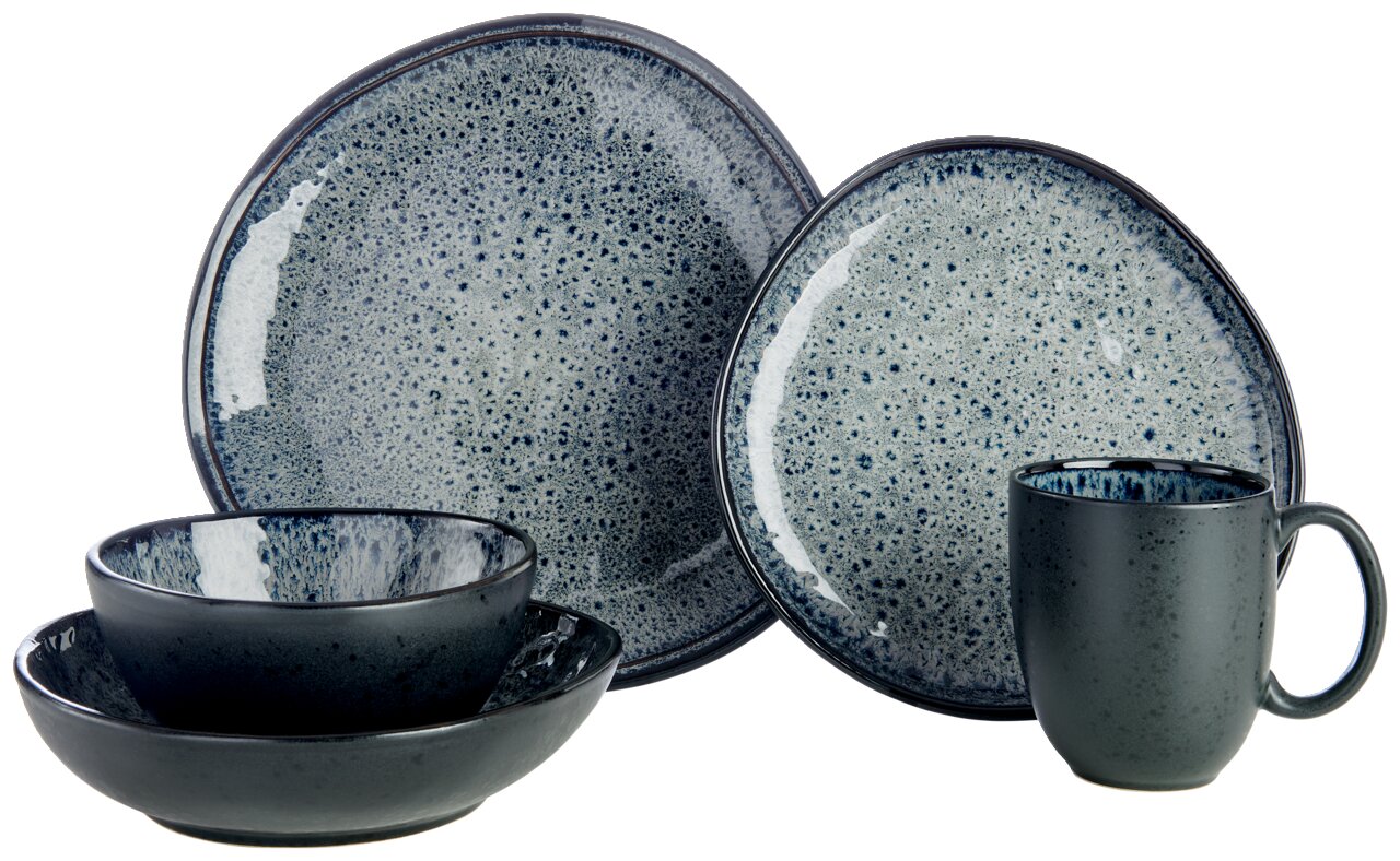 Kombiservice 10-teilig in dunklem, gesprenkeltem Design, bestehend aus Tellern, Schalen und einer Tasse, seitliche Perspektive