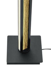 Nahaufnahme der LED-Stehleuchte HELOISE mit schwarzem Sockel und goldener Struktur, von oben betrachtet.