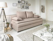 Beiges Funktionssofa in einem hellen Wohnzimmer, seitliche Perspektive, mit Kissen und dekorativen Elementen.