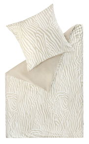 Bettwäsche-Set mit Zebra-Muster in Beige und Weiß, bestehend aus einem Kissenbezug und einem Bettdeckenbezug, aus der Vogelperspektive fotografiert.