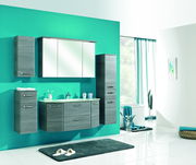 Moderner Badezimmer-Unterschrank in grauer Holzoptik, frontal abgebildet, mit zwei Schubladen und einem Waschbecken.