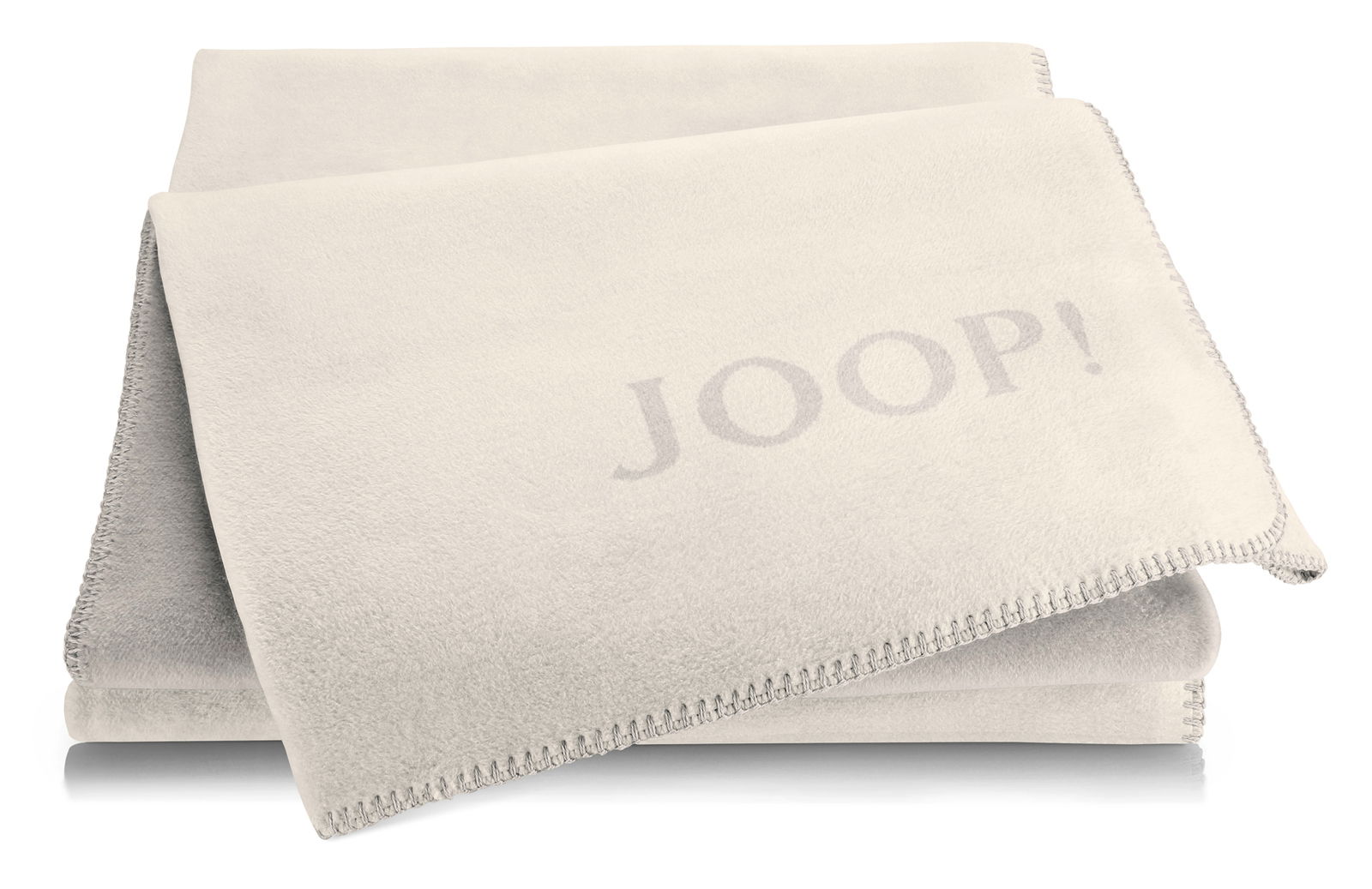 JOOP! Wohndecke UNI-DOUBLEFACE Beige Decke mit JOOP! Logo, gefaltet und von oben fotografiert