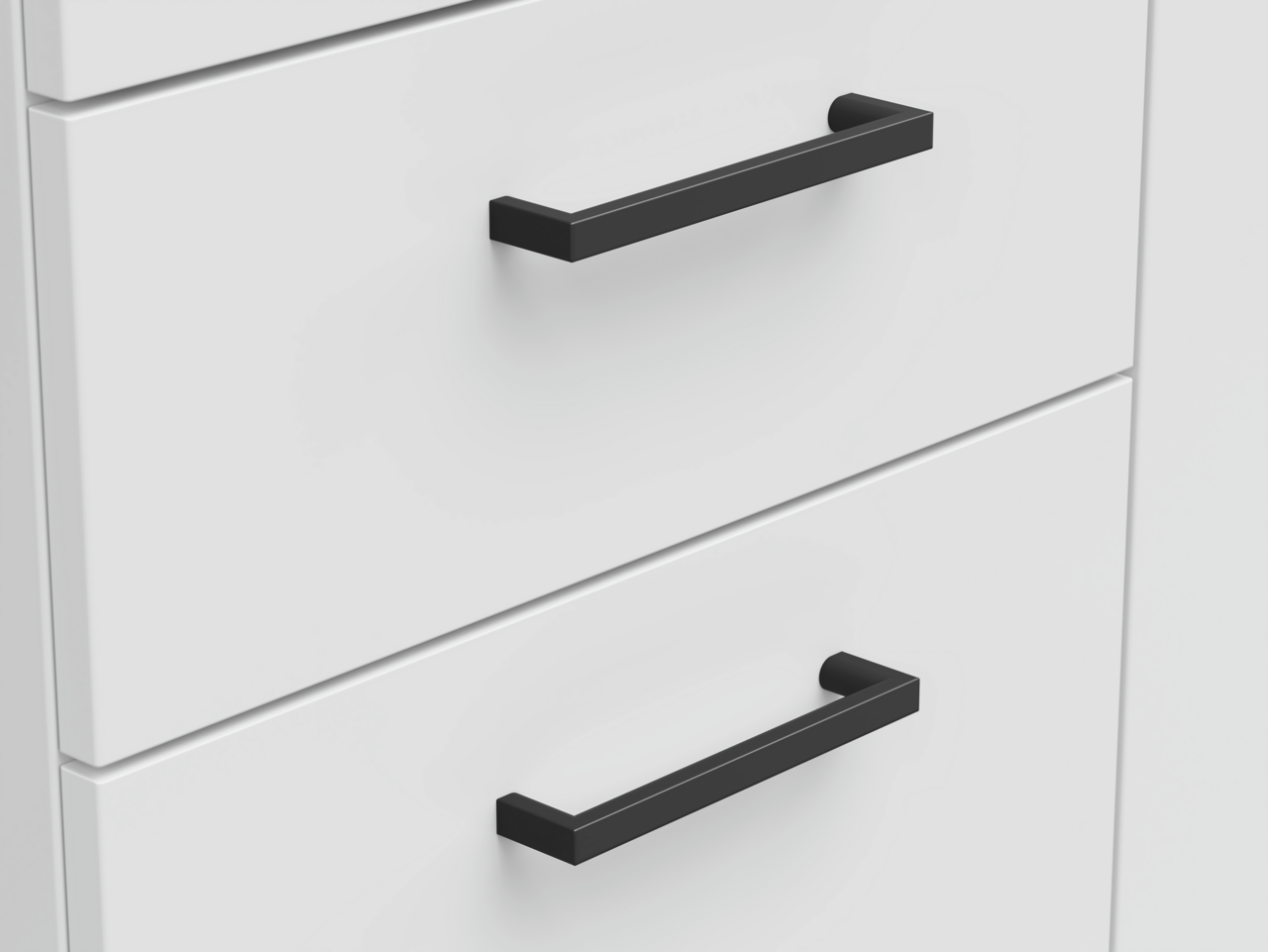 Nahaufnahme von zwei weißen Schubladen mit schwarzen Griffen, perspektivisch von vorne betrachtet.