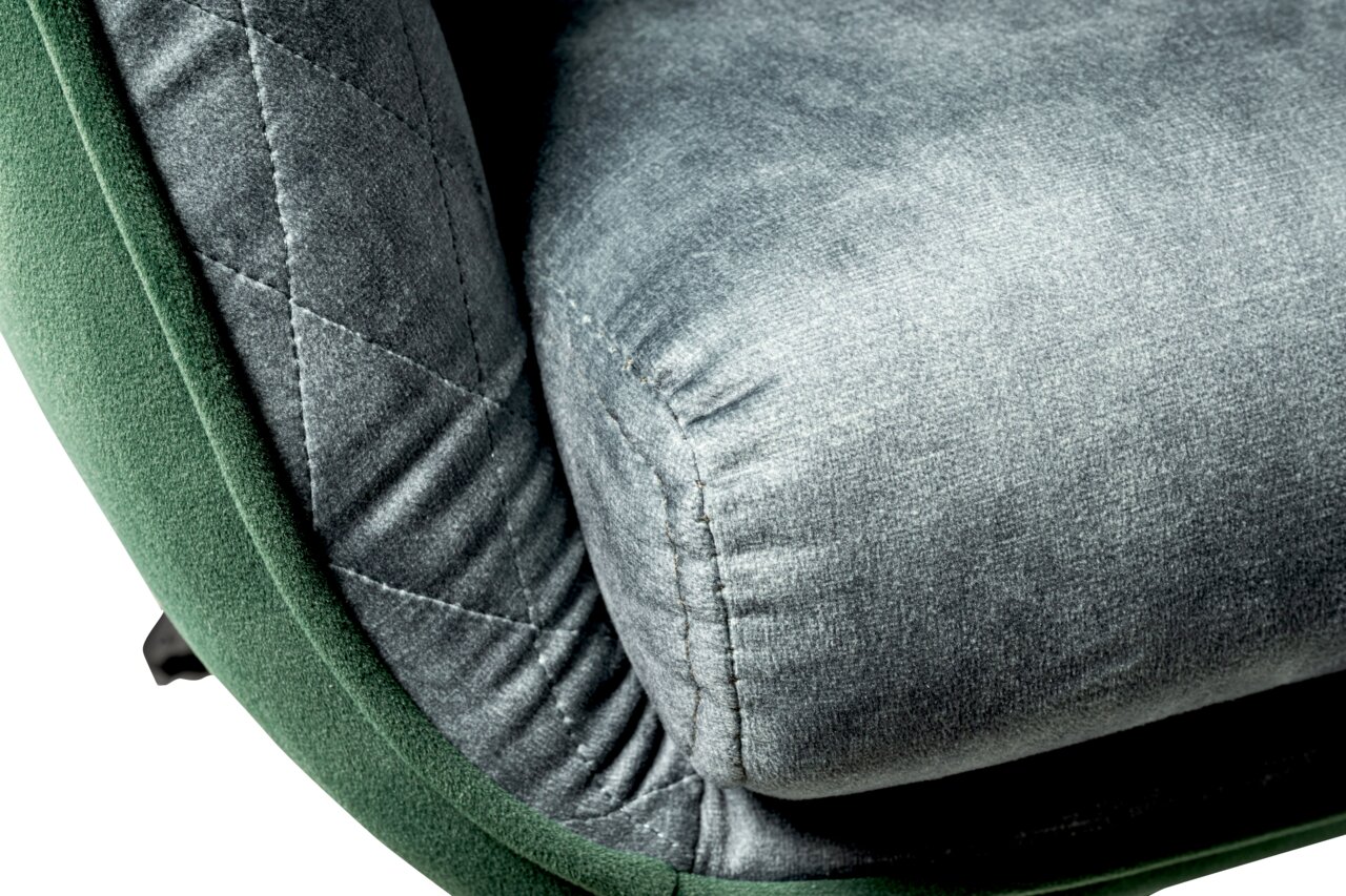 Close-up van een draaistoel met grijze stoffen bekleding en groene accenten, gezien vanaf de zijkant.