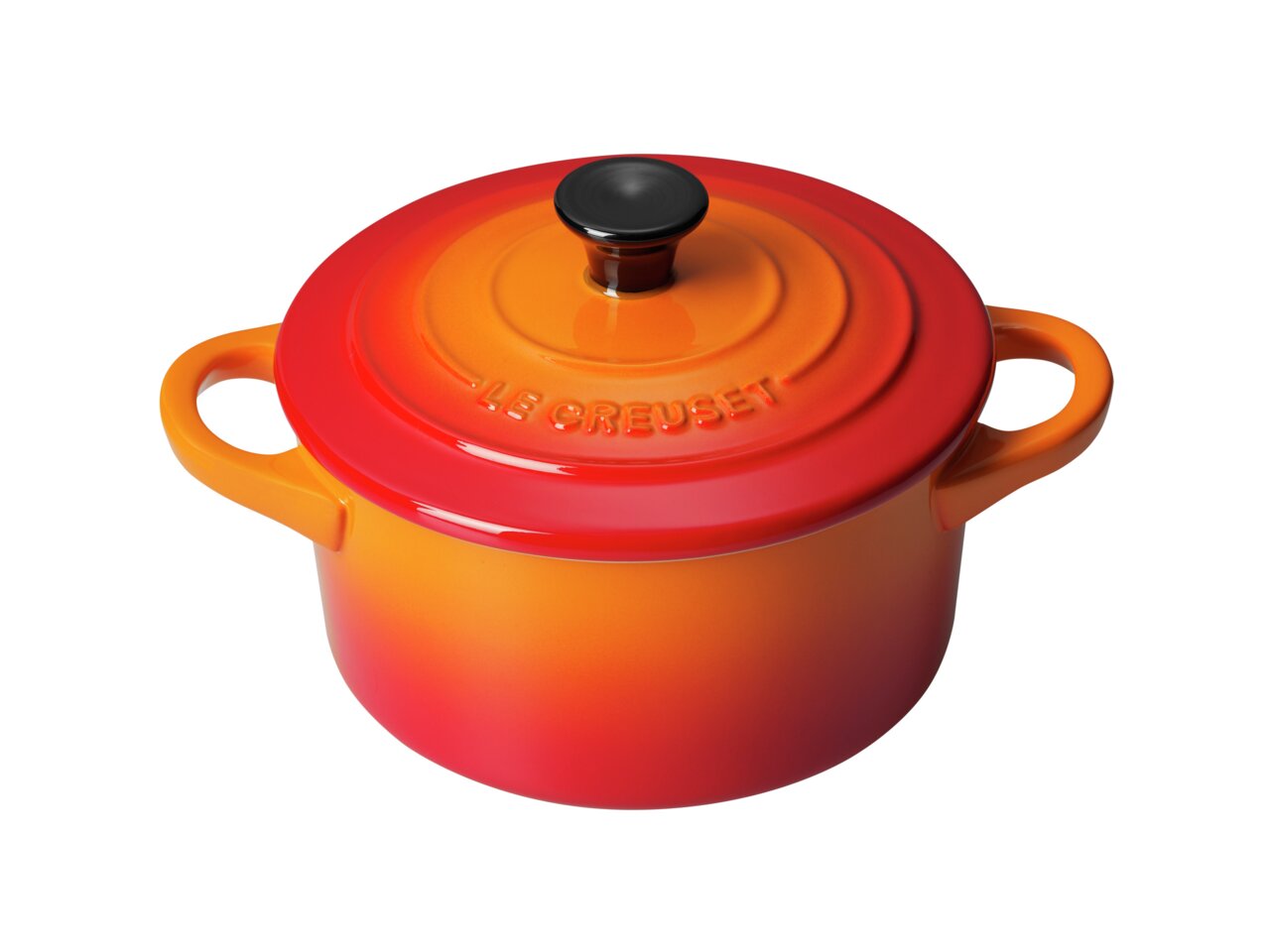Mini-Cocotte in Ofenrot, Draufsicht mit zwei Griffen und schwarzem Knauf auf dem Deckel.