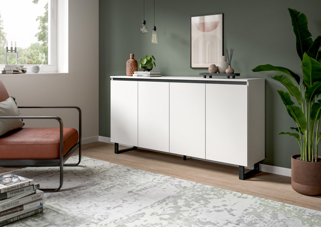 MID.YOU Sideboard TOMASA Modernes weißes Sideboard mit vier Türen, schwarzem Sockel und dekorativen Elementen, seitliche Perspektive.