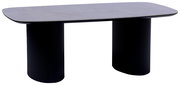 Moderner Couchtisch mit rechteckiger, abgerundeter Tischplatte und zwei geriffelten, zylindrischen Beinen in schwarzer Farbe, seitliche Perspektive.