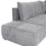 Graues Sofa mit abgerundeter Ecke, seitliche Perspektive