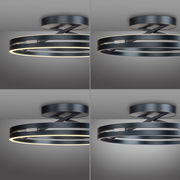 Moderne Deckenleuchte PURE Loop von Paul Neuhaus in schwarzem Metall mit zwei leuchtenden Ringen, seitliche Perspektive.