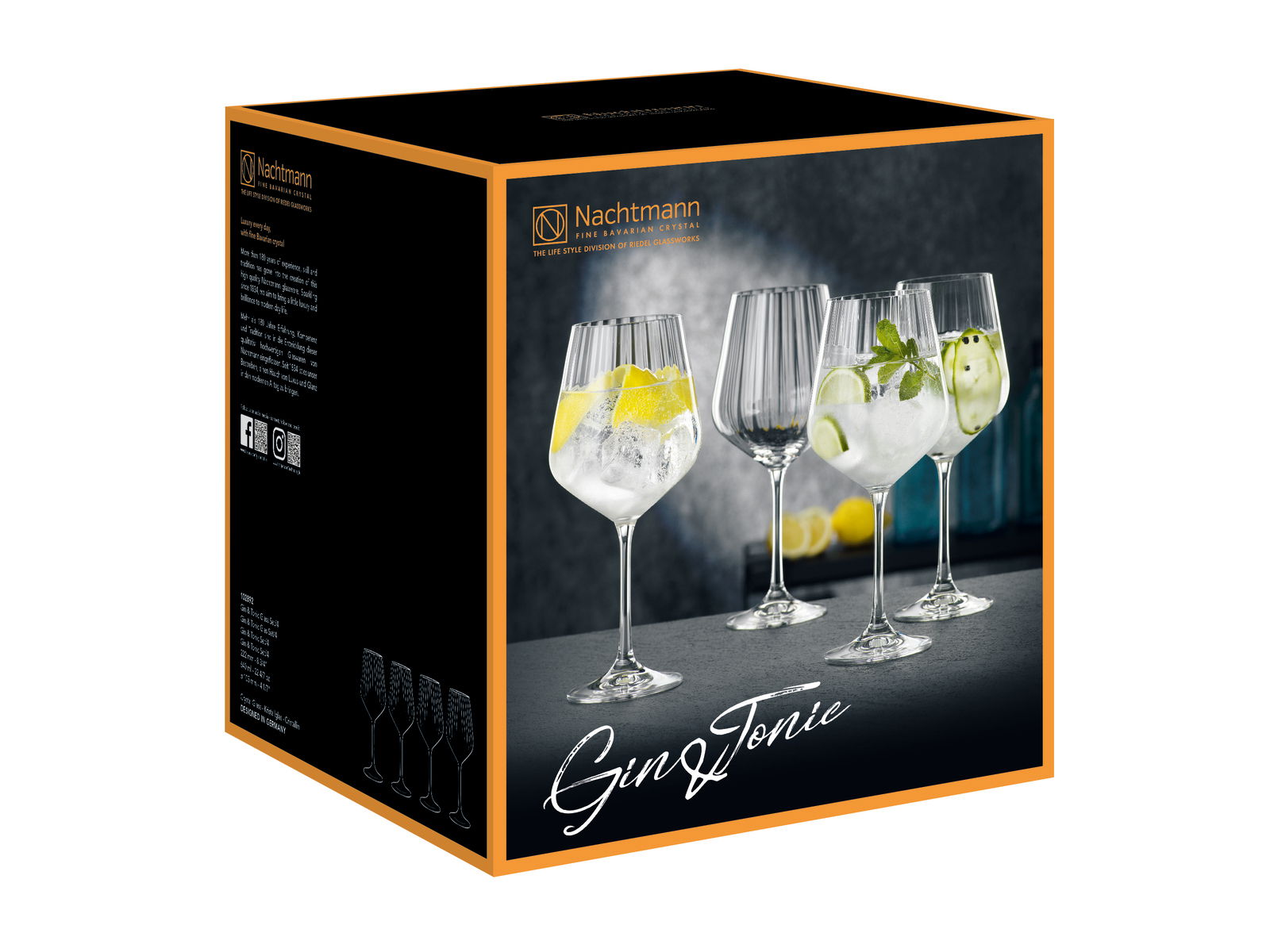 Vier elegante Gin Tonic Gläser in einem Set, präsentiert in einer stilvollen Verpackung mit seitlicher Perspektive.