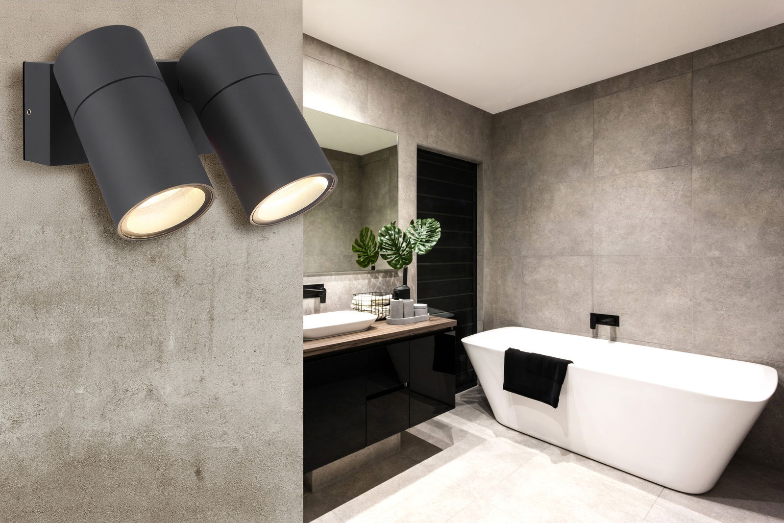 Moderne schwarze Außenwandleuchte mit zwei zylindrischen Strahlern, montiert an einer Betonwand in einem stilvollen Badezimmer. Perspektive von der Seite.