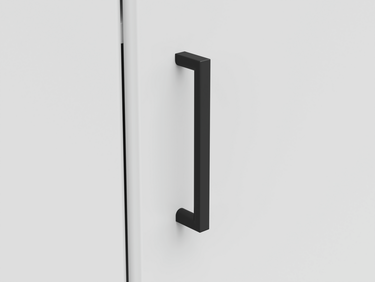 Carryhome Eckkommode MULTISTAURAUM Nahaufnahme eines schwarzen, modernen Griffs an einer weißen Eckkommode, seitliche Perspektive