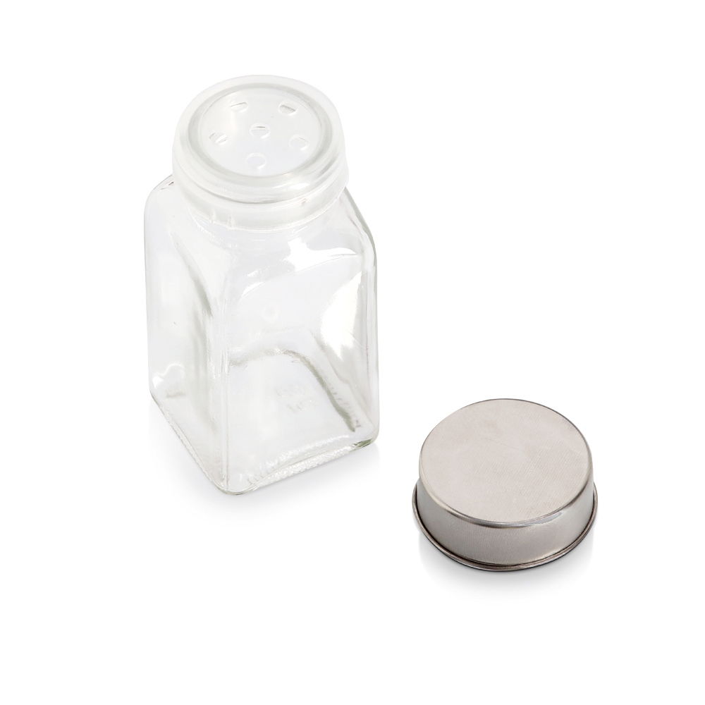 Gewürzglas mit abgenommenem Deckel, aus der Vogelperspektive fotografiert.