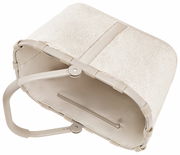 Beiger Einkaufskorb mit weichem, flauschigem Stoff und stabilen Griffen, von oben betrachtet.