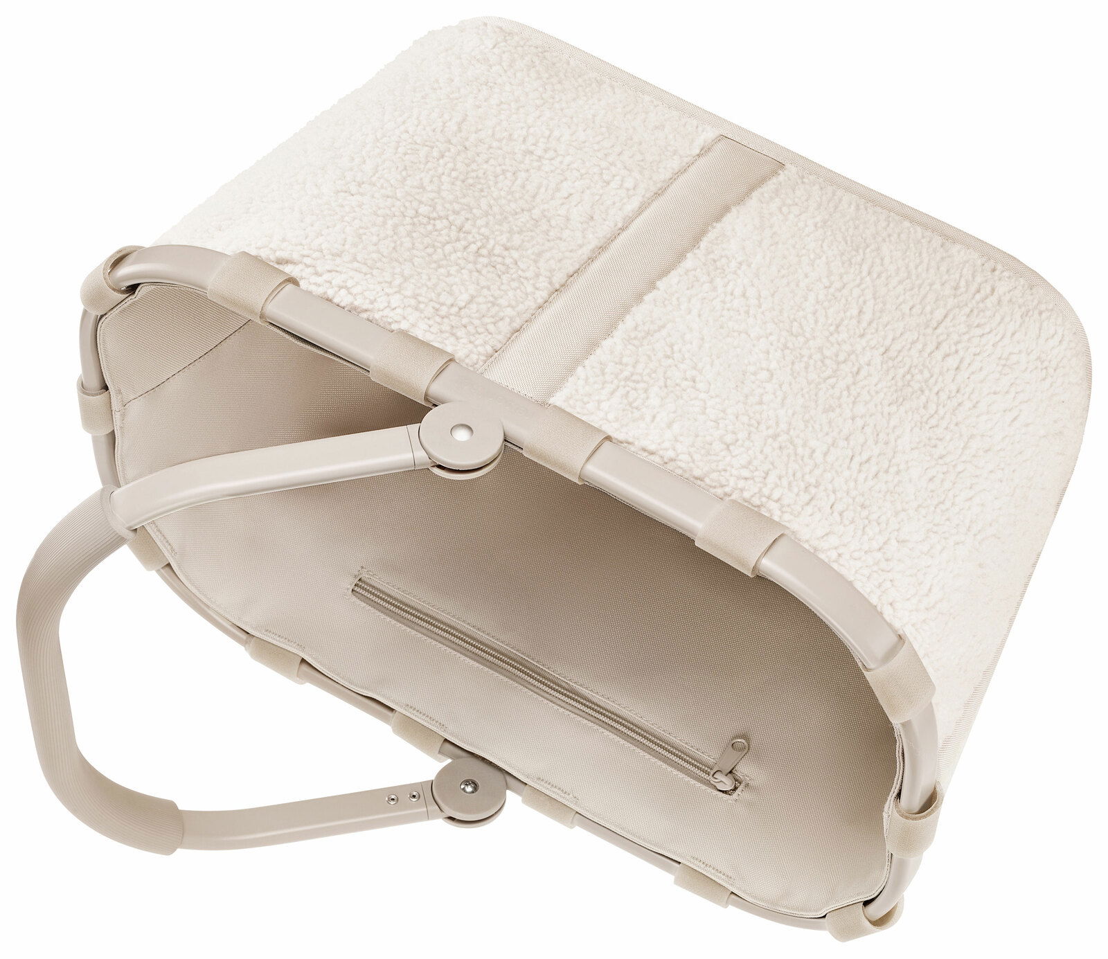 Beiger Einkaufskorb mit weichem, flauschigem Stoff und stabilen Griffen, von oben betrachtet.