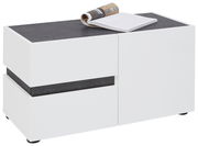 Weiße Bank mit dunkler Oberfläche, darauf liegt ein aufgeschlagenes Buch, seitliche Perspektive