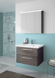 Moderner Badblock mit Waschbecken und Unterschrank in einer Badezimmerumgebung, seitliche Perspektive