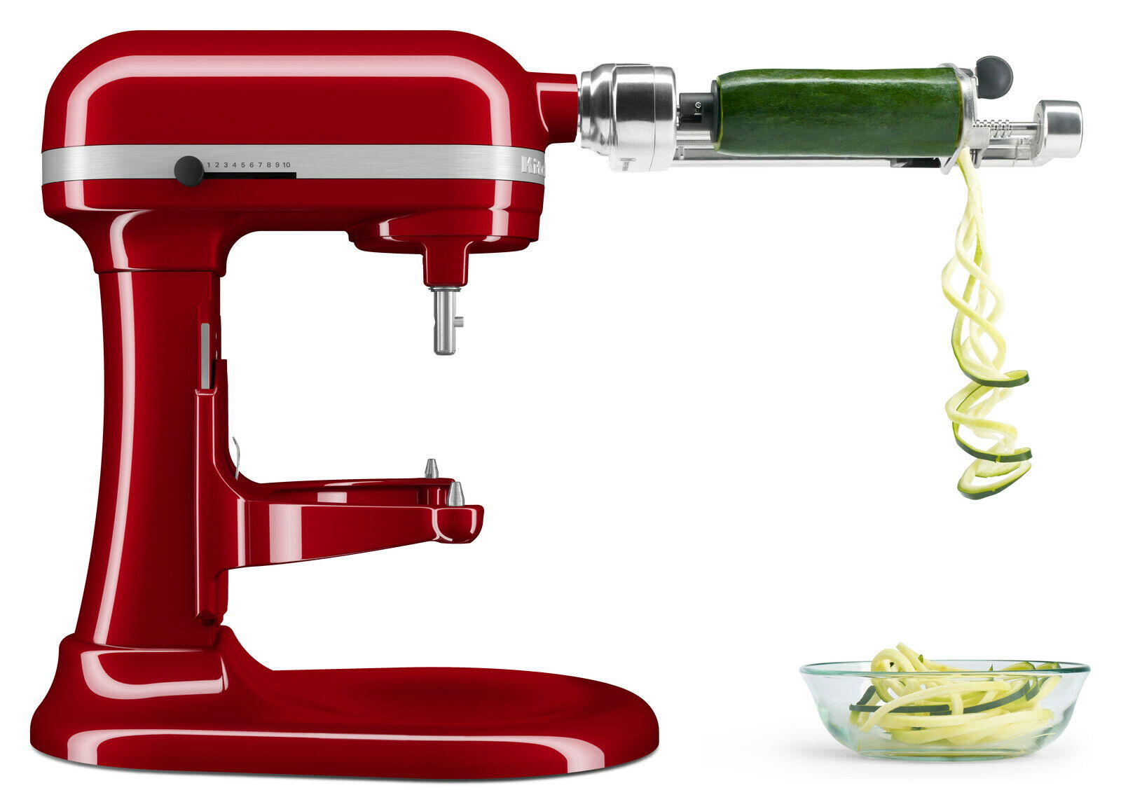 Rote Küchenmaschine Heavy Duty 5,2L mit Spiralaufsatz, seitliche Ansicht, spiralförmig geschnittene Zucchini in einer Schüssel.