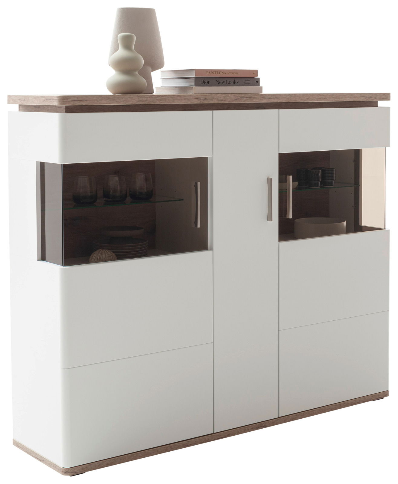 Modernes Highboard mit weißem Korpus und Holzoberfläche, seitliche Perspektive, dekoriert mit einer Lampe und Büchern.