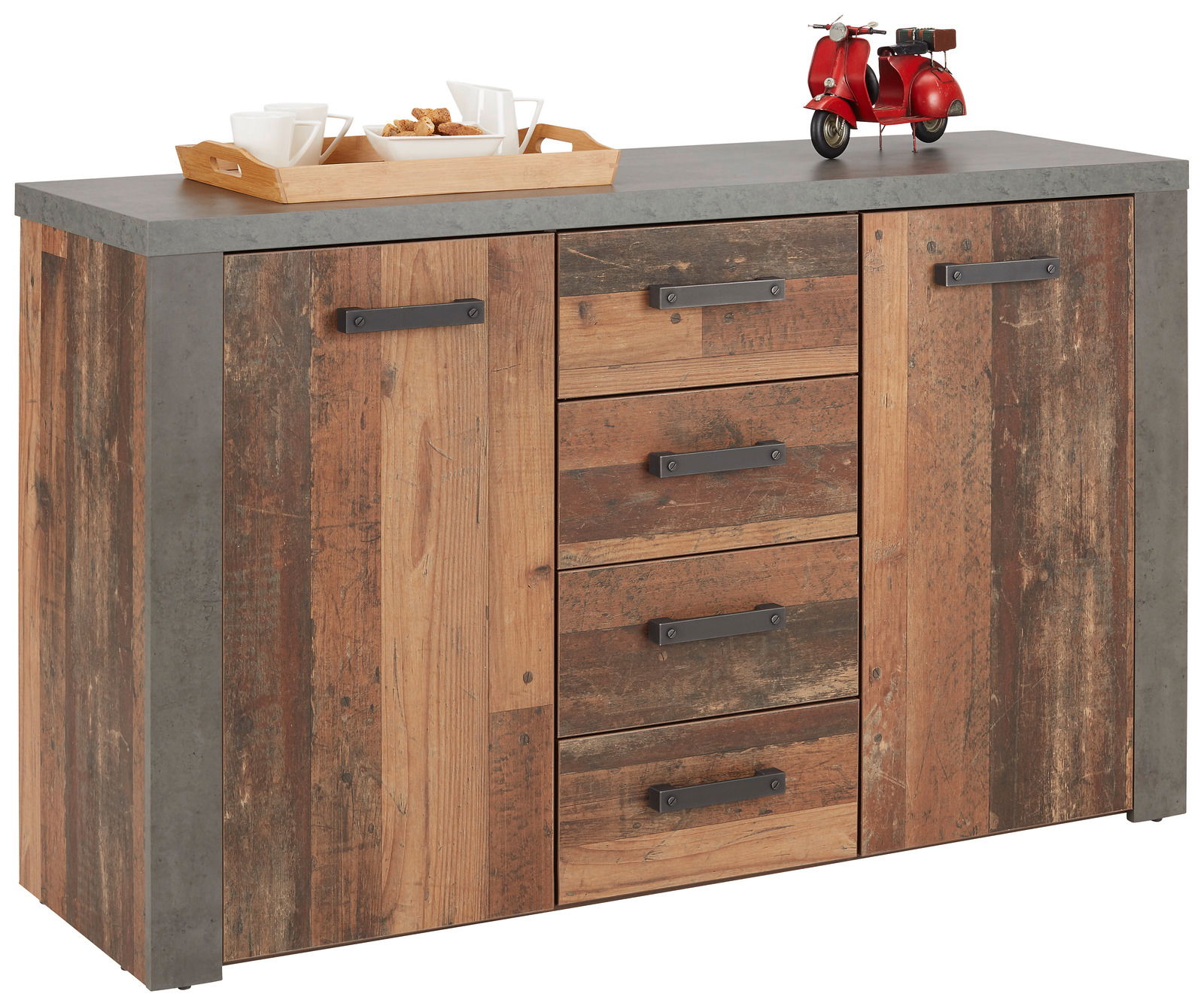 Kommode aus Holz mit rustikalem Design, drei Schubladen und zwei Türen, von vorne betrachtet. Auf der Oberseite steht ein Tablett mit Tassen und eine kleine rote Vespa-Dekoration.