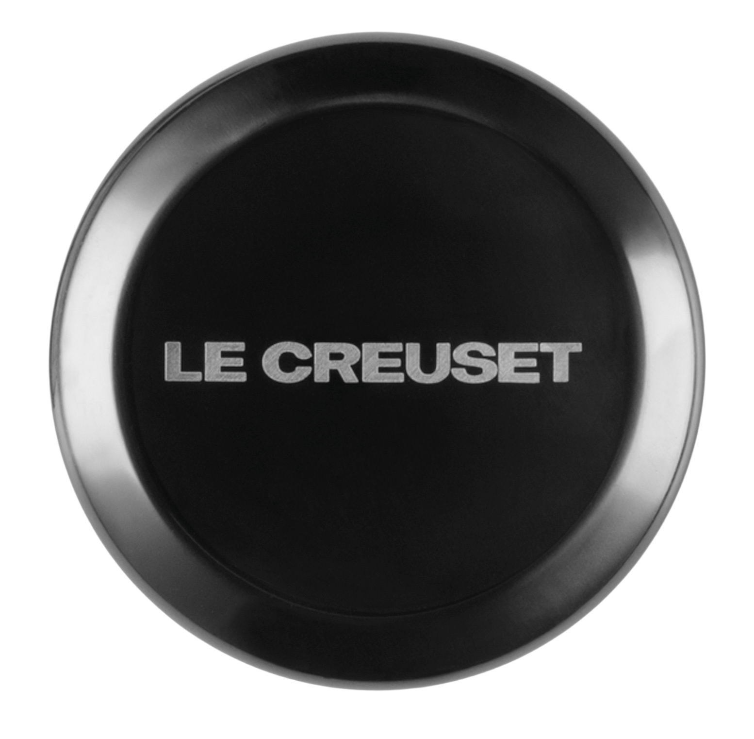 Schwarzer Deckelknopf aus Nickel mit der Aufschrift 'Le Creuset', von oben betrachtet.