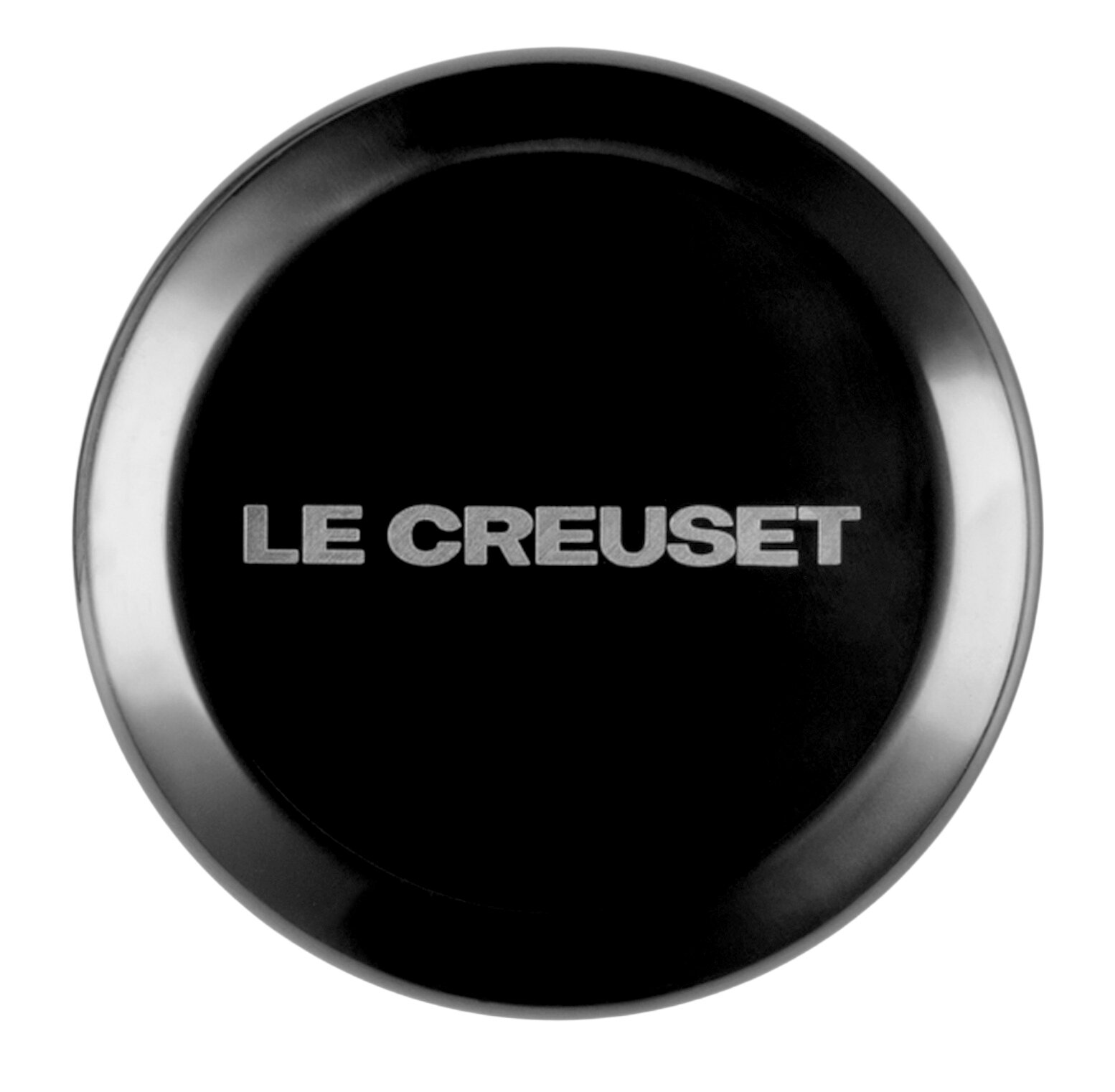 Schwarzer Deckelknopf aus Nickel mit der Aufschrift 'Le Creuset', von oben betrachtet.