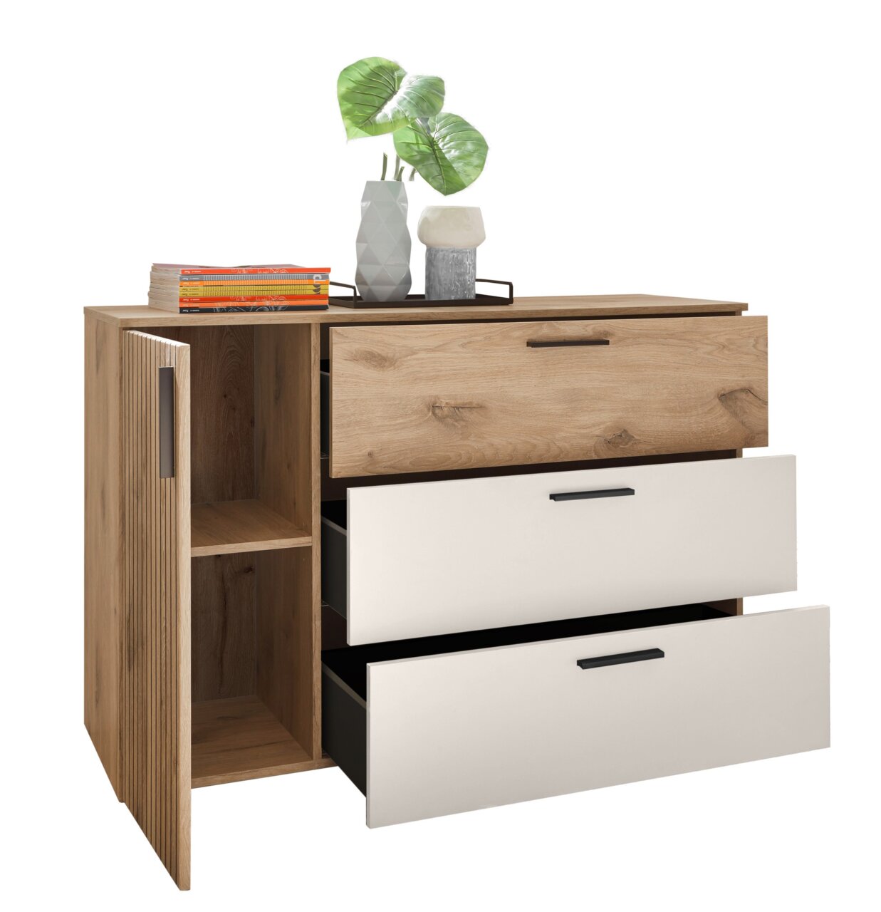 Commode met twee open lades en een deur, van hout met een witte en naturel afwerking, versierd met planten en boeken, gezien vanaf links vooraan