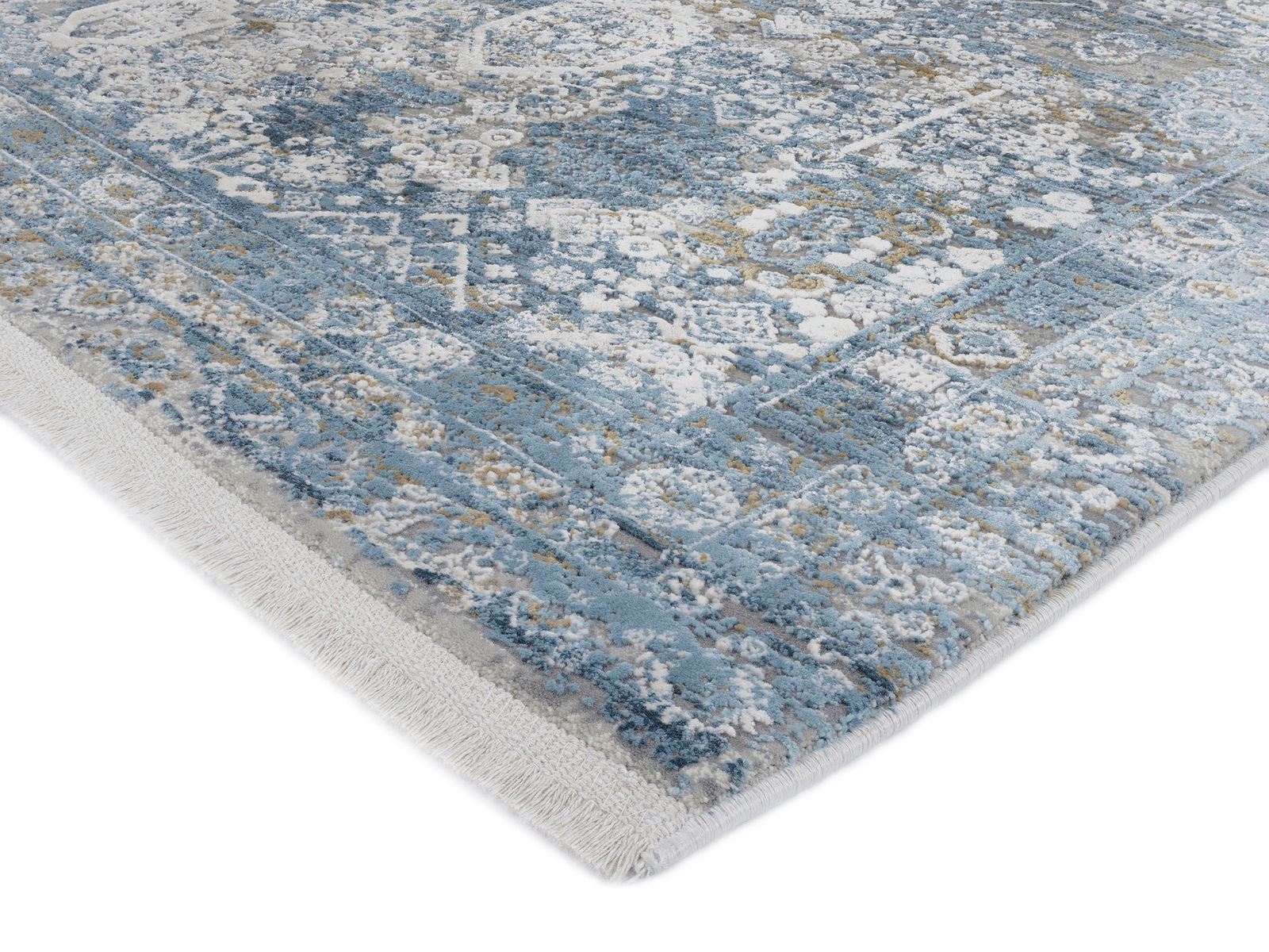 Designer Teppich in Blau- und Grautönen mit detailliertem Muster, perspektivisch von der Seite aufgenommen.