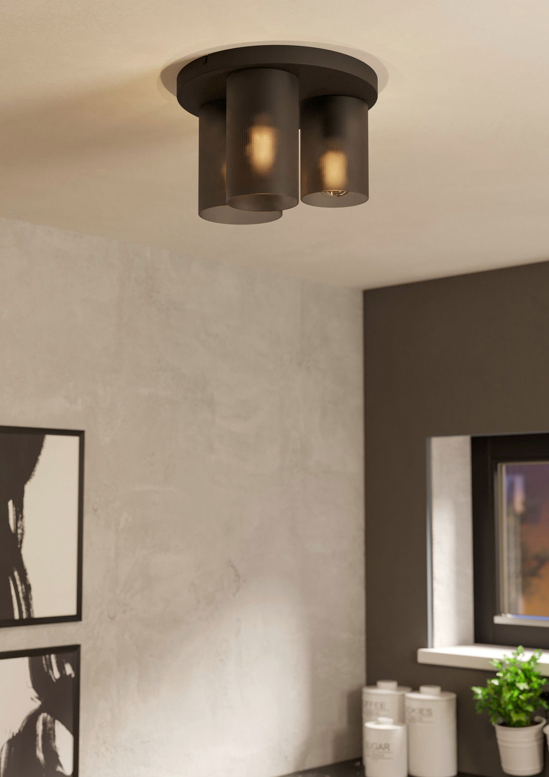 Moderne Deckenleuchte COLOMERA mit drei zylindrischen Schirmen in einem stilvollen Raum, von unten betrachtet.