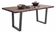 Moderne eettafel met massief houten blad en metalen poten, zijaanzicht