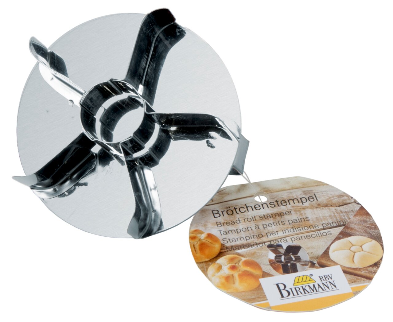 Metalen broodstempel, gefotografeerd van bovenaf, met etiket van RBV Birkmann.