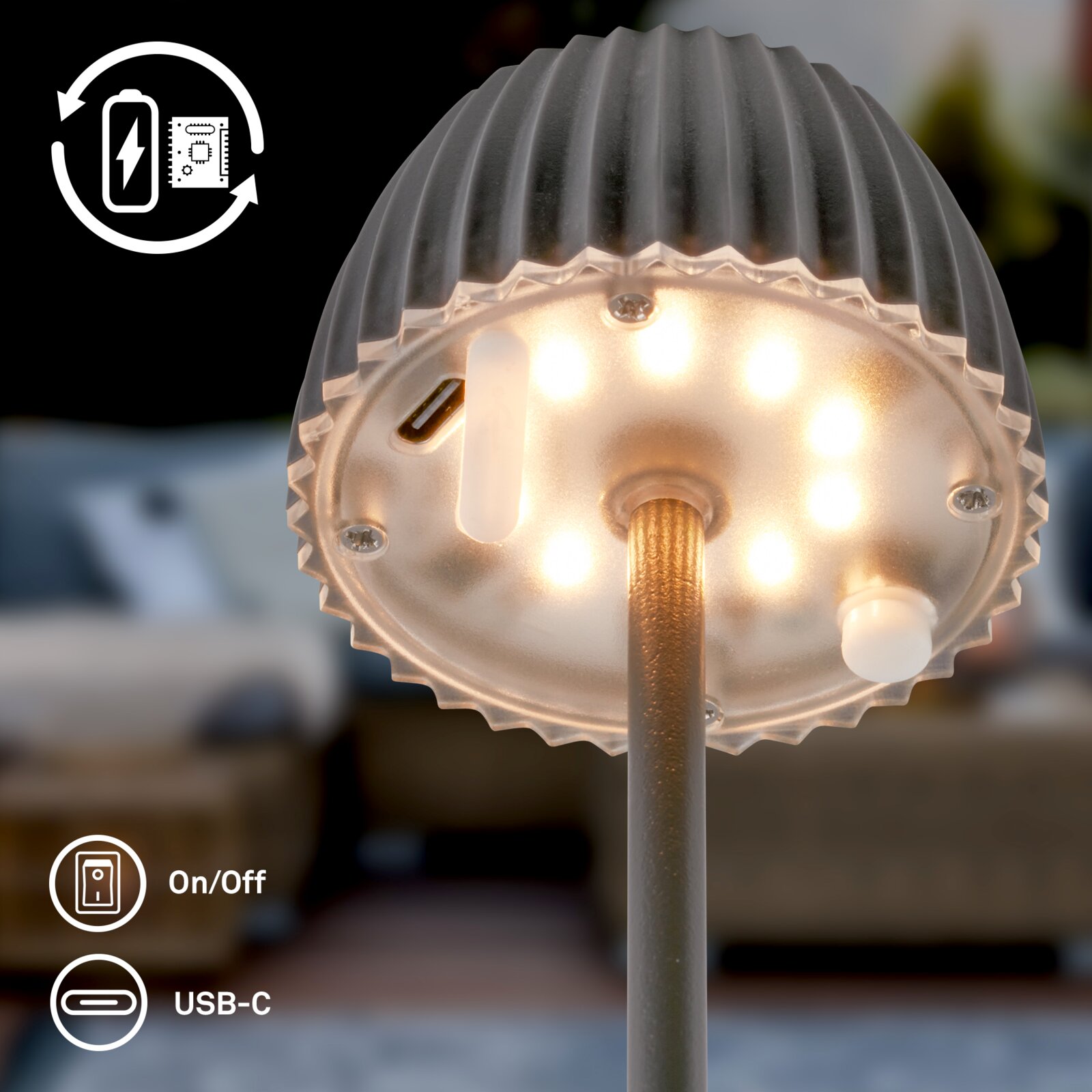 Unterseite einer kabellosen LED-Lampe mit warmweiß leuchtenden LEDs, USB-C-Ladeanschluss und Ein/Aus-Schalter, Nahaufnahme aus Untersicht.