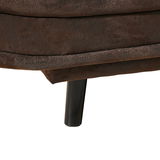 Nahaufnahme eines braunen Funktionssofas mit schwarzem Bein, seitliche Perspektive